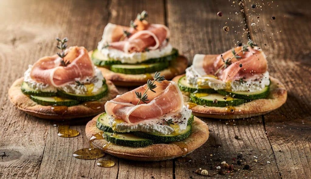 Mini pizzas courgette, chèvre et jambon de Parme